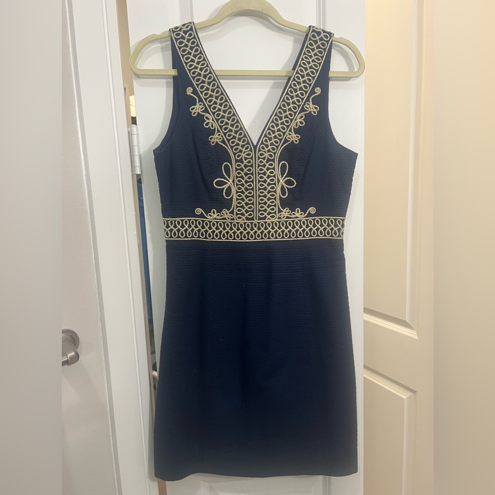 Lilly Pulitzer navy and gold dress.